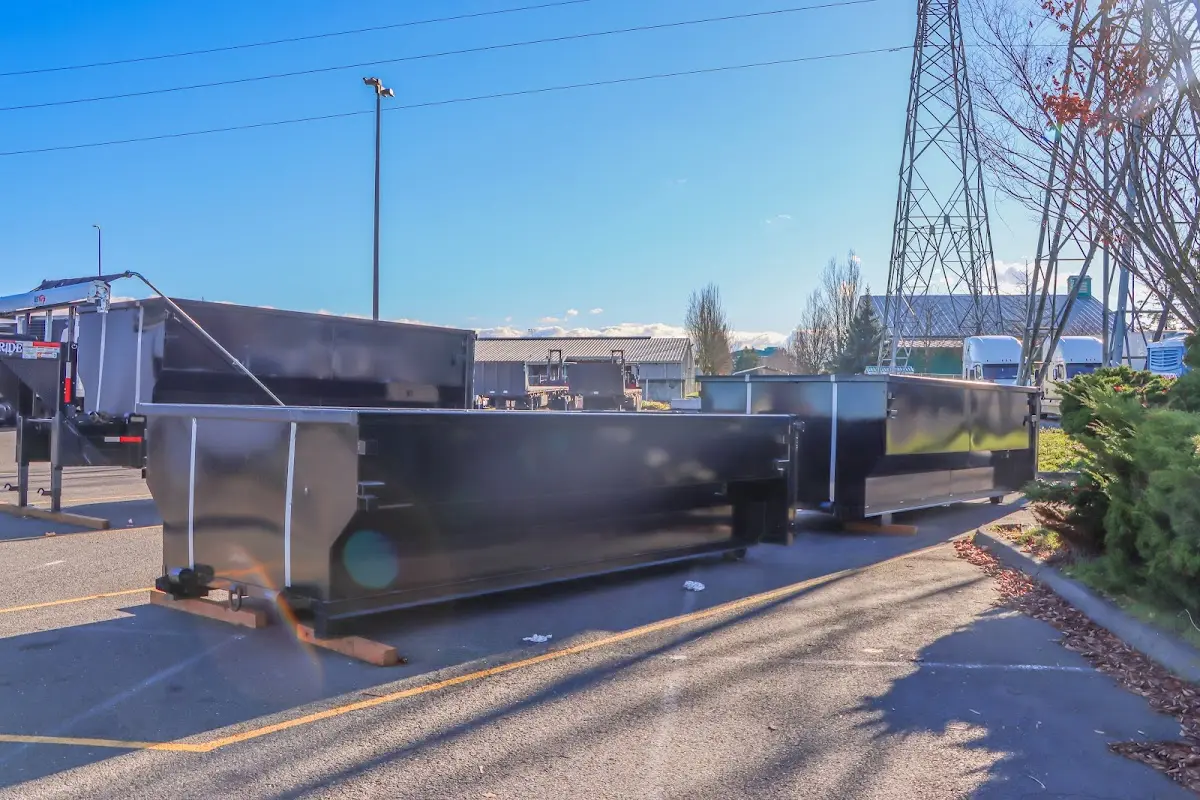 Roll-off dumpster ready for waste disposal at job site for Yard Waste Dumpster Rental in Shively